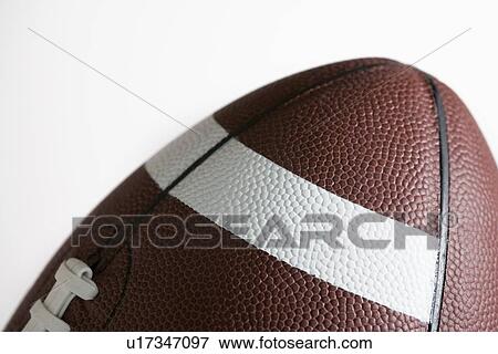 Stock Photo - Close-up of an American/Canadian football. Fotosearch