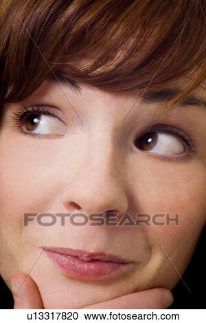 Close up of woman thinking View Large Photo Image Stock Image - Close up of woman thinking. Fotosearch