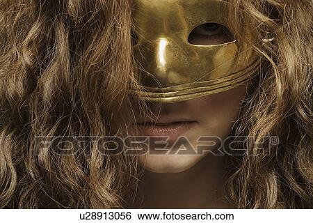 Closeup of woman with mask View Large Photo Image Stock Photograph - Closeup of woman with mask. Fotosearch