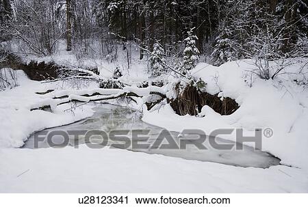 Stock Image - Creek in the snow. Fotosearch