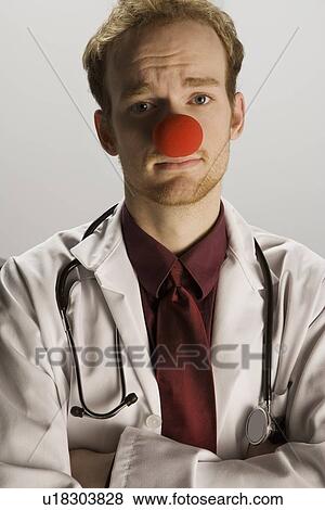 Stock Photo - Doctor wearing a clown's nose. Fotosearch
