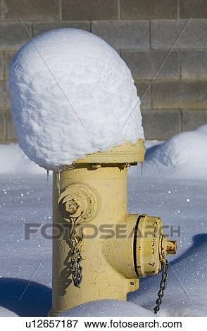 Stock Photo - Fire Hydrant In The Snow. Fotosearch