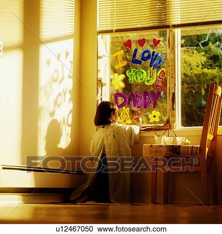 Girl painting the window with "I love you Daddy" View Large Photo Image Stock Image - Girl painting the window with "I love you Daddy". Fotosearch
