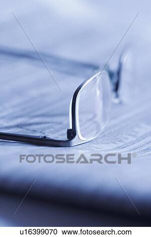 Glasses on newspaper View Large Photo Image Stock Image - Glasses on newspaper. Fotosearch