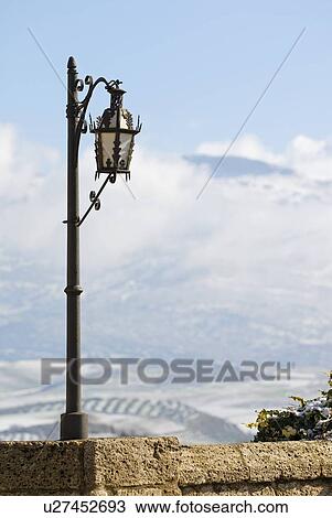 Stock Image - Lamppost on the Puente Nuevo in Málaga, Spain. Fotosearch