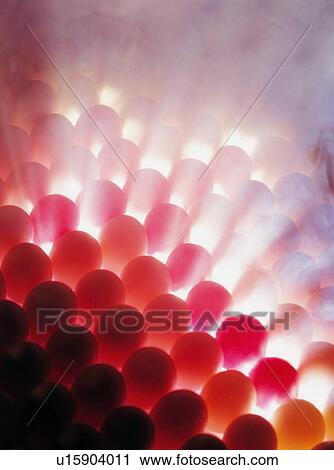 Stock Image - Light shining through eggs. Fotosearch