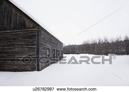 Log building during the winter View Large Photo Image Stock Photo - Log building during the winter. Fotosearch