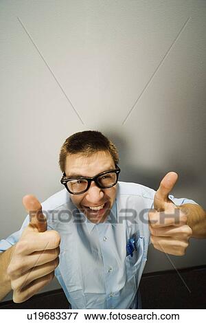 Stock Photo - Man giving thumbs up. Fotosearch