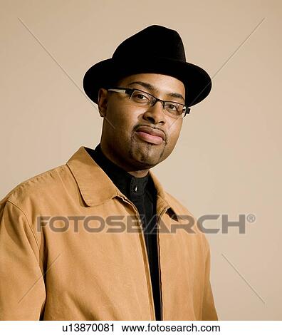 Man with a hat View Large Photo Image Stock Image - Man with a hat. Fotosearch