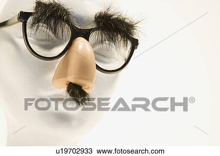Stock Image - Mannequin wearing groucho glasses. Fotosearch