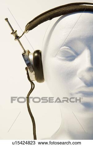 Mannequin wearing headphones View Large Photo Image Stock Image - Mannequin wearing headphones. Fotosearch