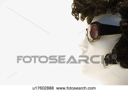 Mannequin with curly brown wig and sunglasses View Large Photo Image Stock Photo - Mannequin with curly brown wig and sunglasses. Fotosearch
