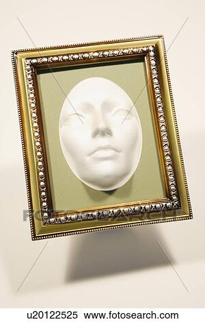Mask in a picture frame View Large Photo Image Stock Photography - Mask in a picture frame. Fotosearch