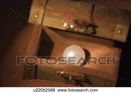 Pearl in a wooden box View Large Photo Image Stock Photo - Pearl in a wooden box. Fotosearch