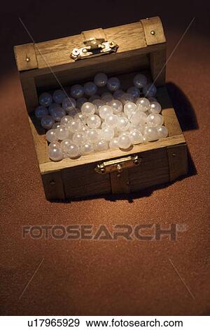 Pearls in a wooden box View Large Photo Image Stock Photo - Pearls in a wooden box. Fotosearch
