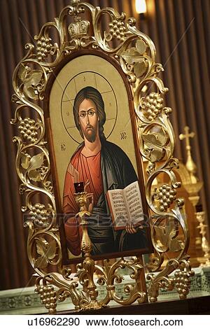 Stock Image - Picture of Jesus with gold frame. Fotosearch