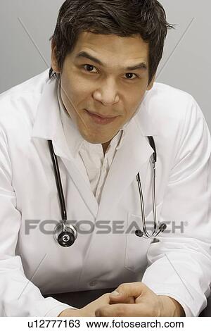 Portrait of a doctor View Large Photo Image Stock Image - Portrait of a doctor. Fotosearch