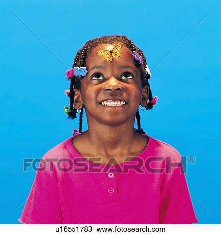 Stock Image - Portrait of smiling girl. Fotosearch