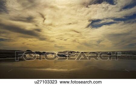 Sand and ocean at sunset View Large Photo Image Stock Image - Sand and ocean at sunset. Fotosearch