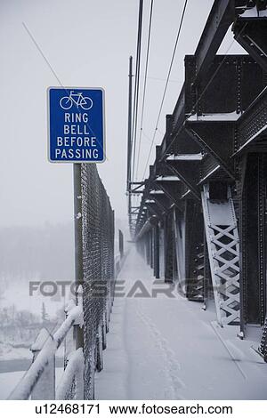 Snow covered bicycle path View Large Photo Image Stock Image - Snow covered bicycle path. Fotosearch