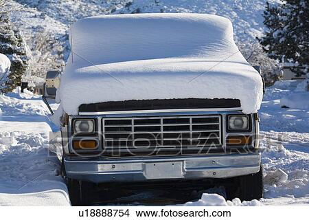 Picture - Snow-covered truck. Fotosearch