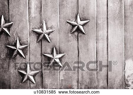 Stock Photography - Stars mounted on a vertically lined background. Fotosearch