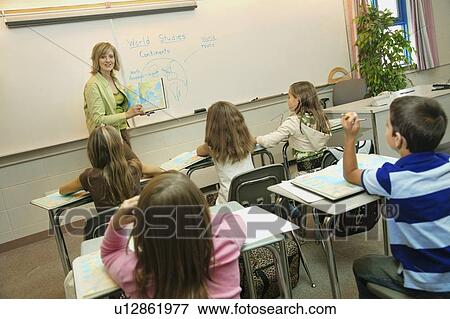 Students in a classroom View Large Photo Image Stock Photo - Students in a classroom. Fotosearch