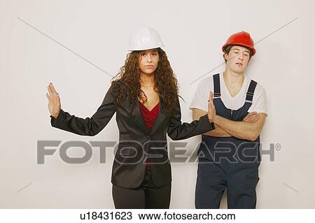 Stock Image - Supervisor and tradesman. Fotosearch