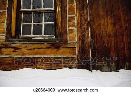 Stock Photo - Window of a log cabin. Fotosearch