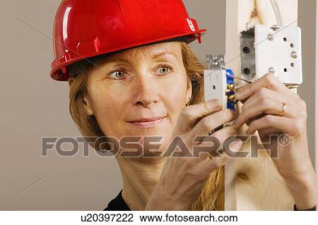Stock Image - Woman at work. Fotosearch