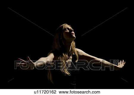 Woman holding arms out View Large Photo Image Stock Image - Woman holding arms out . Fotosearch