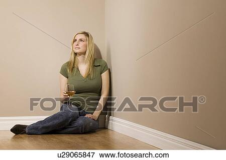 Woman holding wine glass View Large Photo Image Stock Photo - Woman holding wine glass. Fotosearch