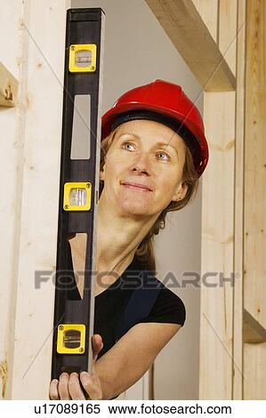 Stock Photography - Woman on the job. Fotosearch