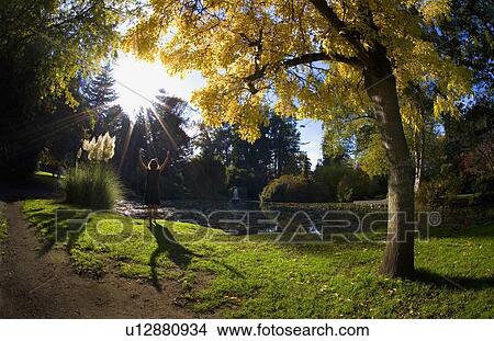 Woman praying outdoors View Large Photo Image Picture - Woman praying outdoors. Fotosearch
