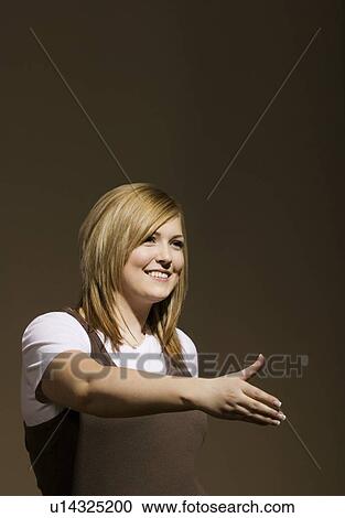Woman reaching out hand View Large Photo Image Stock Image - Woman reaching out hand. Fotosearch