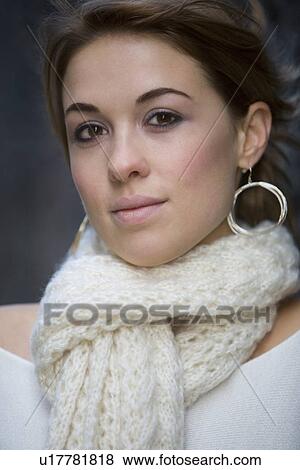 Woman wearing a scarf View Large Photo Image Stock Photo - Woman wearing a scarf. Fotosearch