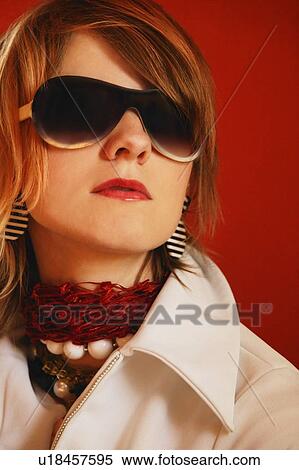 Stock Photography - Woman wearing sunglasses. Fotosearch