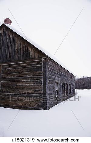 Stock Photo - Wooden building in snow. Fotosearch