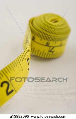 Yellow tape measure View Large Photo Image Stock Photography - Yellow tape measure. Fotosearch