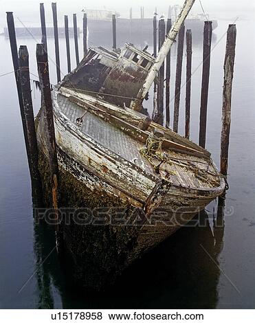 Stock Photo - A broken boat . Fotosearch