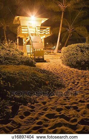 A lifeguard hut on the beach at night View Large Photo Image Picture - A lifeguard hut on the beach at night. Fotosearch