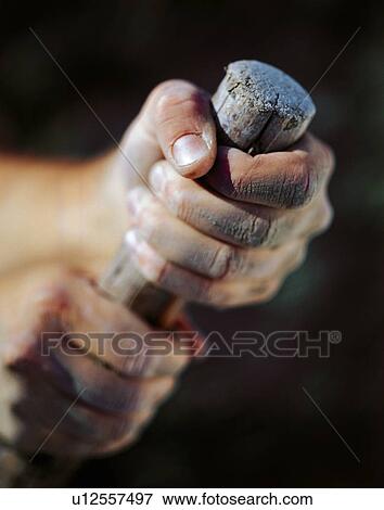 A person holding wood View Large Photo Image Stock Photo - A person holding wood. Fotosearch