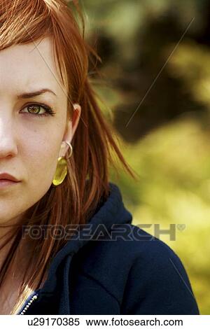 A woman looking at the camera View Large Photo Image Stock Photography - A woman looking at the camera. Fotosearch