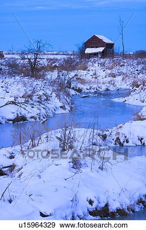 Abandoned shack near frozen creek in winter View Large Photo Image Stock Photo - Abandoned shack near frozen creek in winter. Fotosearch