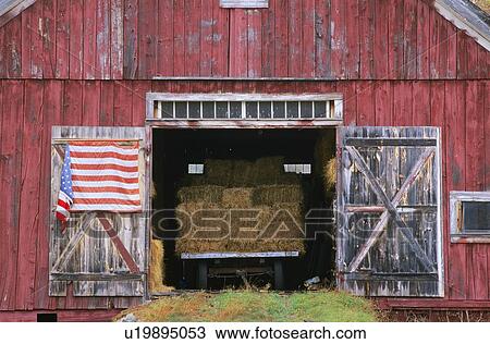 American Flag Hanging From A Barn Door Stock Image U19895053