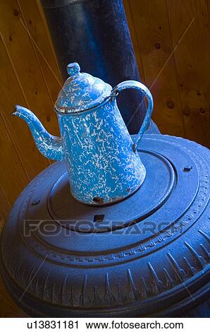 Antique coffee pot on pot belly wood stove View Large Photo Image Stock Image - Antique coffee pot on pot belly wood stove . Fotosearch