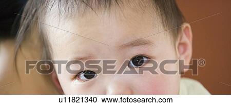 Stock Image - Asian baby crying. Fotosearch