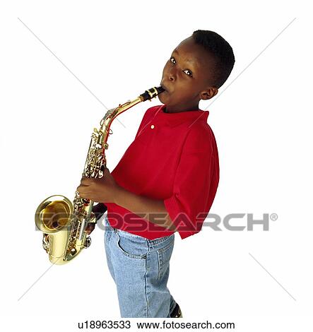 Boy playing the saxophone View Large Photo Image Stock Image - Boy playing the saxophone. Fotosearch