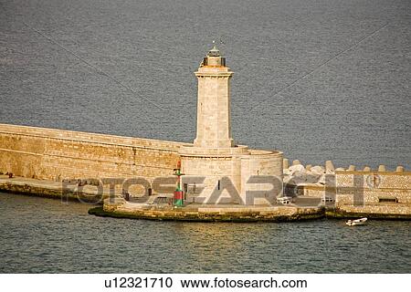 Stock Image - Breakwater Lighthouse, Port of Livorno, Tuscany, Italy . Fotosearch