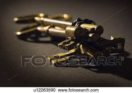 Stock Image - Bundle of old skeleton keys . Fotosearch